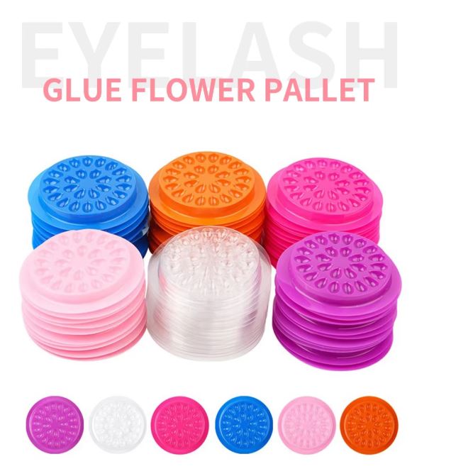 100 colorful flower-shaped disposable glue holders for eyelash extensions — hygienic, fun, and mess-free adhesive control tools.
